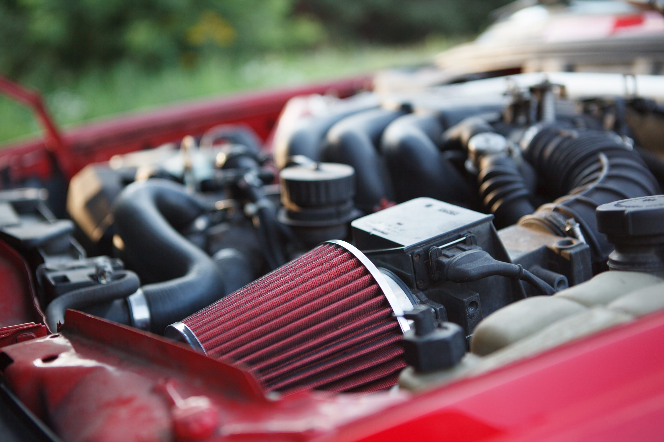 Close up of air filter on a vehicle with car mods