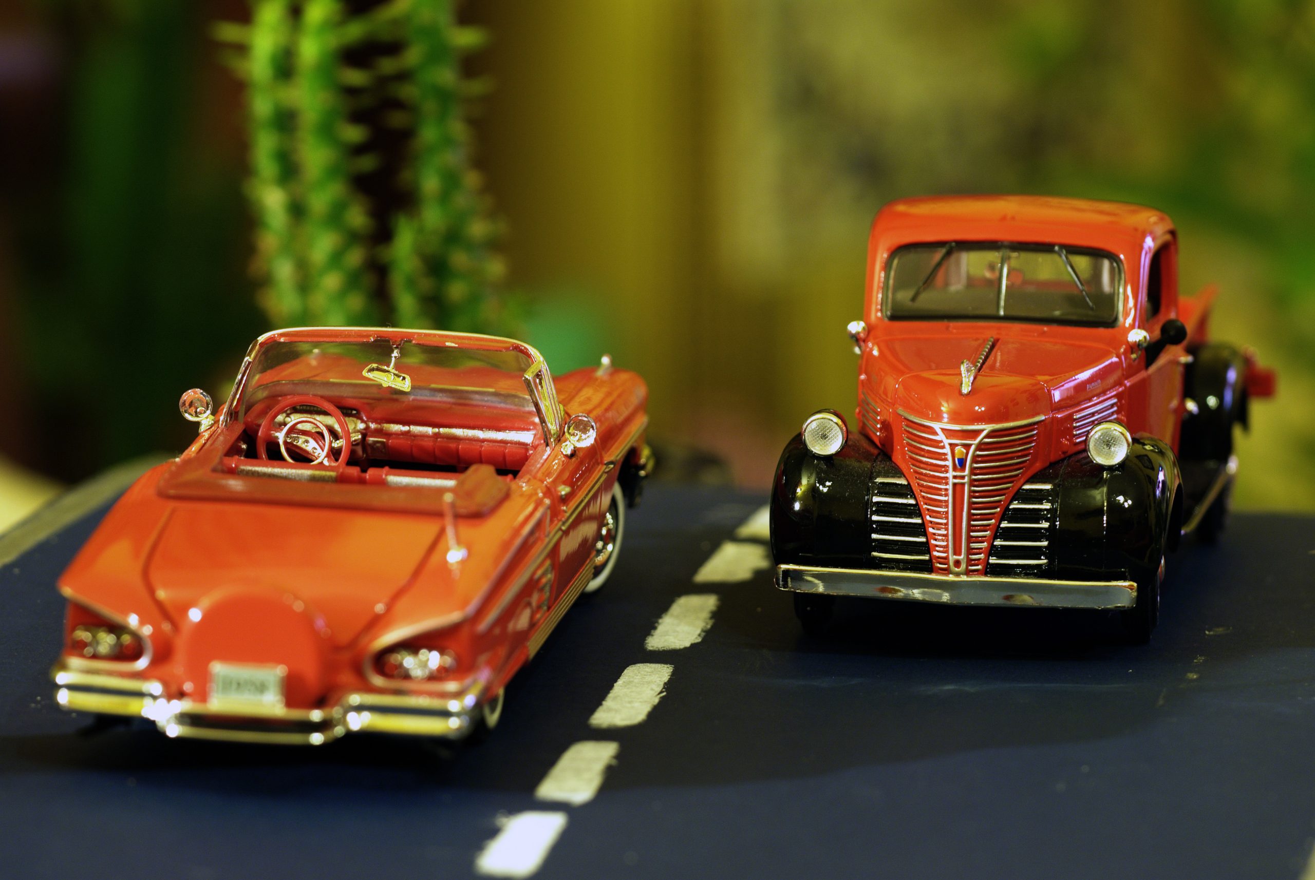 Classic cars on a diorama track similar to what the best youtube channel might use