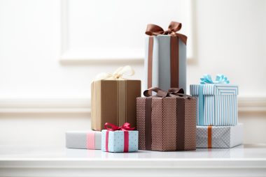 table with several wrapped items considered to be the author's greatest gifts