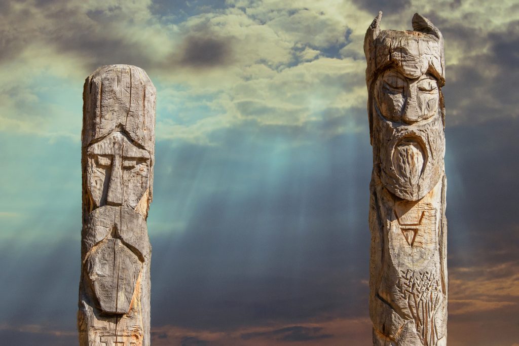 False idols stand against a scenic landscape