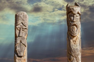 False idols stand against a scenic landscape
