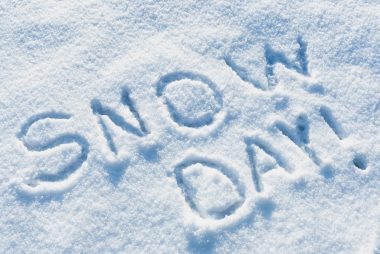 The words Snow Day written in fresh snow.